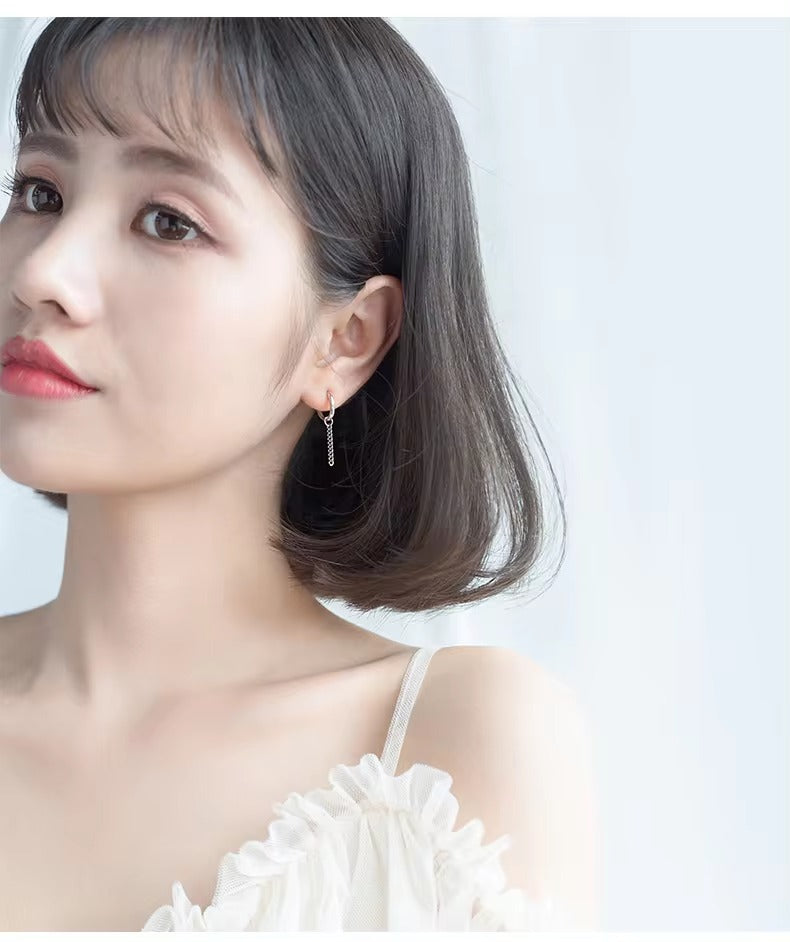 pendientes colgantes redondos con borla