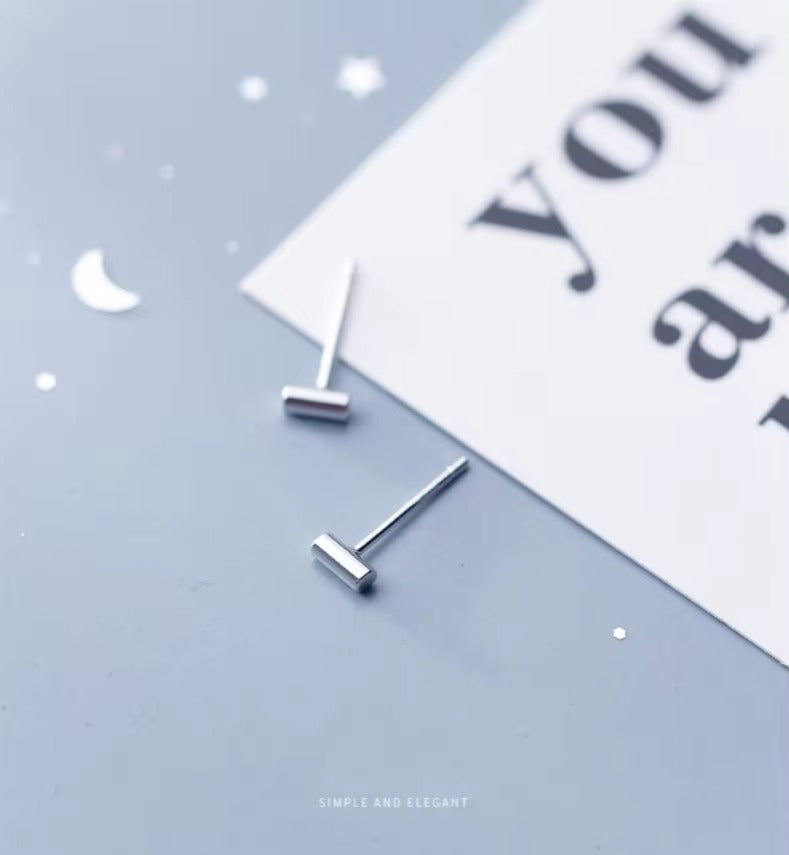 pendientes de tuerca cilíndricos minimalistas para mujer
