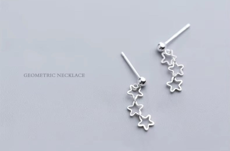 pendientes de tuerca con estrellas caladas para mujer