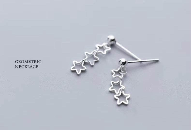 pendientes de tuerca con estrellas caladas para mujer