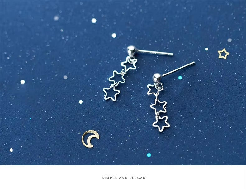 pendientes de tuerca con estrellas caladas para mujer