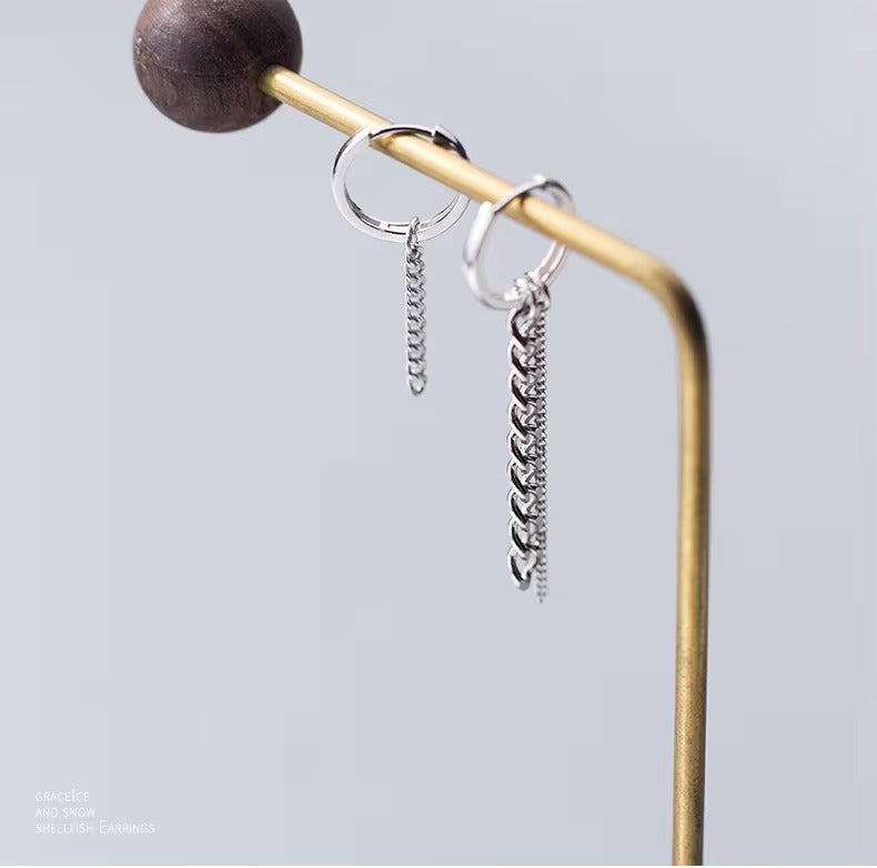 pendientes colgantes redondos con borla