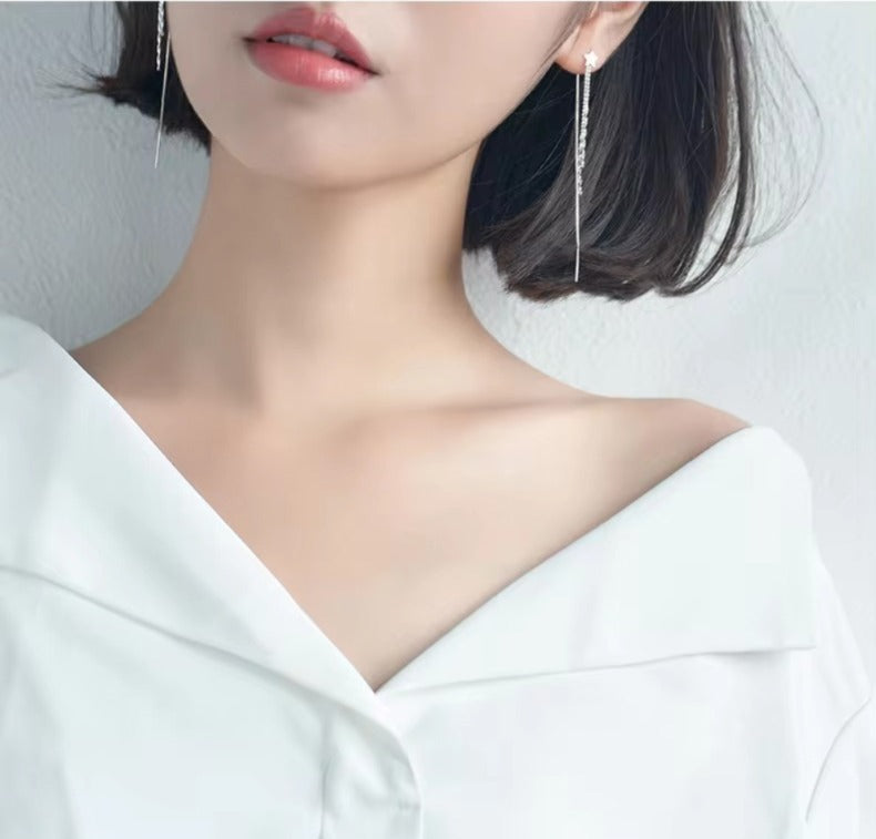 Pendientes largos de moda con borla de estrellas de Modian