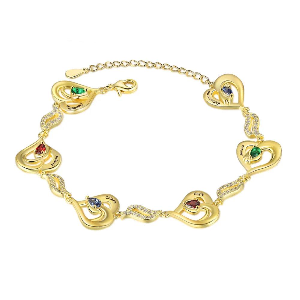 Pulsera de oro con diseño de corazón y piedras de nacimiento