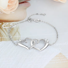 Load image into Gallery viewer, Pulsera de corazón entrelazado de Color plateado con circonita cúbica para mujer